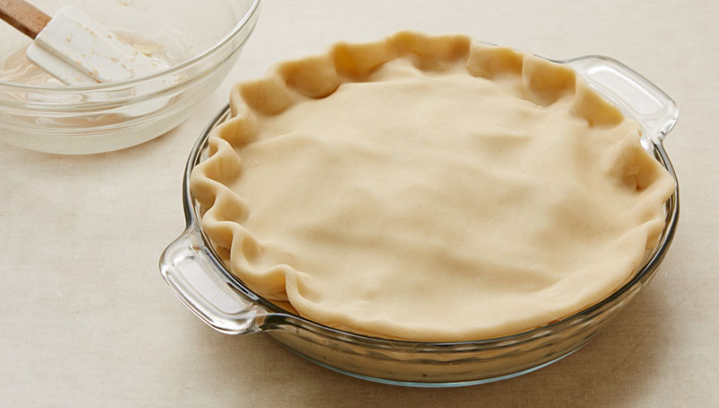 Fluted edges on pie dough